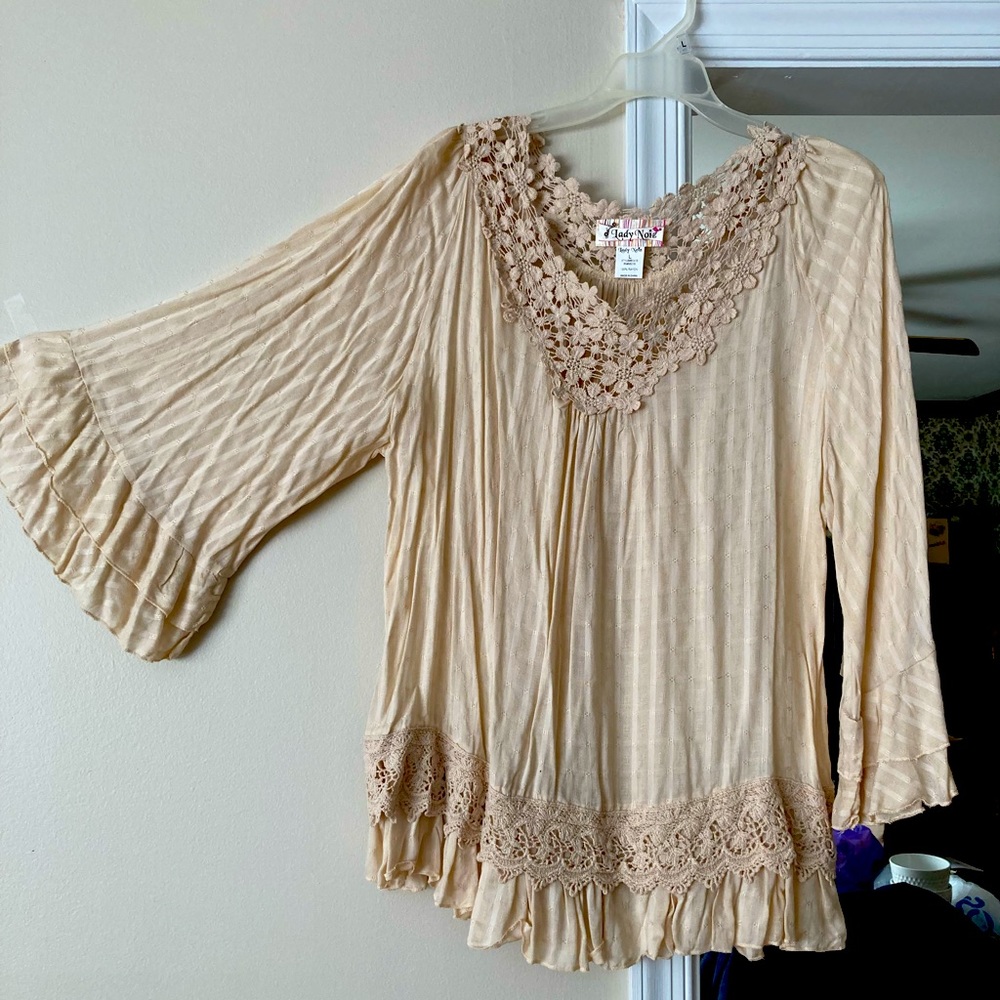 Large beige crocheted women’s top
